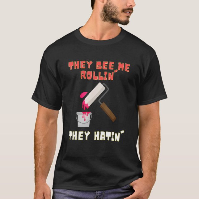 Camiseta Eles Me Veem Rolando Pintel De Cilindro (Frente)