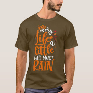 Camiseta Em Cada Vida Uma Pequena Queda Deve Chover Inspira