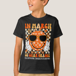 Camiseta Em março use deficiência de desenvolvimento laranj