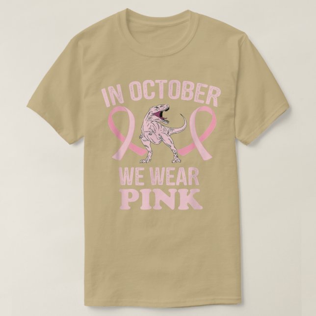 Camiseta Em outubro, Vestimos Dinossauros Rosa Que Podem Fa (Frente do Design)