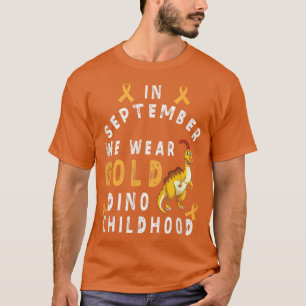 Camiseta Em setembro Vestimos dino dourado Infância e pesso