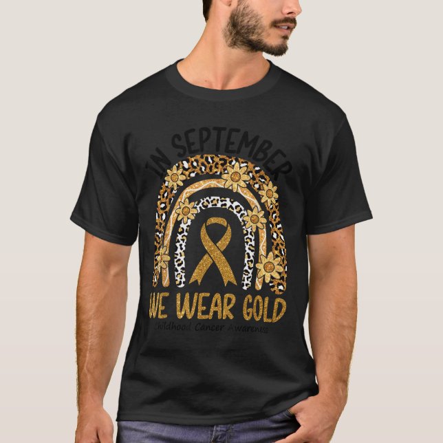Camiseta Em setembro Vestimos o Cancer Dourado da Infância  (Frente)