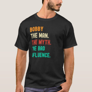 Camiseta Engraçado. Bobby. O Homem. O Mito. A má influência