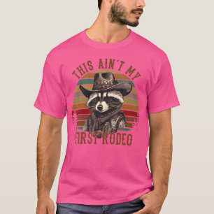 Camiseta Este Não É Meu Primeiro Rodeio Raccoon Western Cou