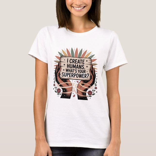 Camiseta Eu Crio Humanos. Qual é Seu Superpoder (Frente)