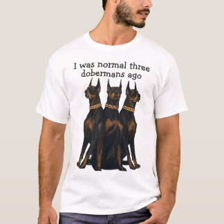 Camiseta Eu era normal há três dobermanes