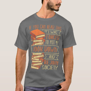 Camiseta Eu Fui Forçado A Pôr Meu Livro Em Leitura