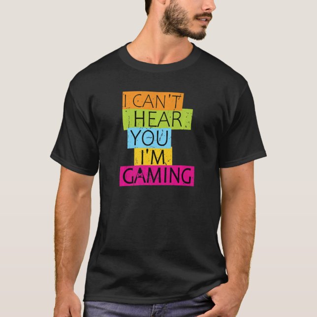Camiseta Eu não consigo ouvir você Estou jogando games ocup (Frente)