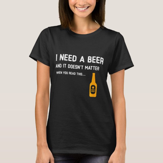 Camiseta Eu Preciso De Uma Cerveja E Não Precisa Quando Lê  (Frente)