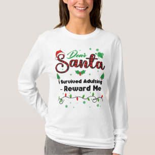 Camiseta Eu Sobrevivi à Vida Adulta_ Me Recompense Natal Co