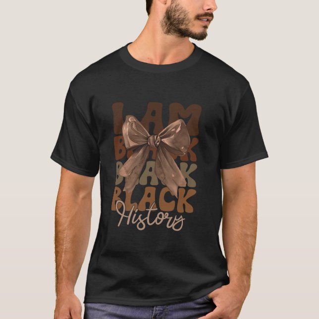Camiseta Eu sou a História Negra Mês Arco Coquette afro Ame (Frente)