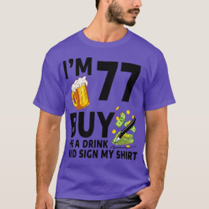 Camiseta Eu Tenho 77 Me Comprar Uma Bebida E Assina Minha 7
