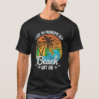 Camiseta Eu Tenho 99 Problemas Mas Uma Praia Em Um Tropical