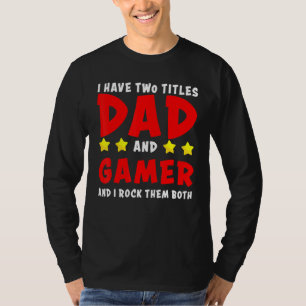 Camiseta Eu Tenho Dois Títulos De Pai E Jogador E Eu Os Rod