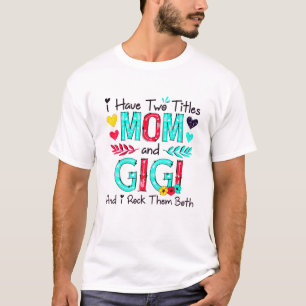 Camiseta Eu Tenho Dois Títulos Mãe E Gigi Mulher Decoraç