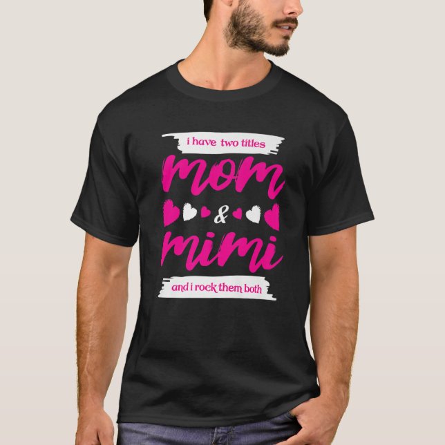 Camiseta Eu Tenho Dois Títulos Mamãe E Mimi E Eu Os Rodo (Frente)