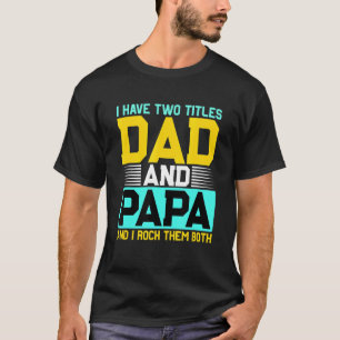 Camiseta Eu Tenho Dois Títulos Para Pai E Papá E Aroma-Os