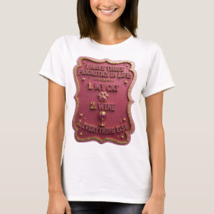 CAMISETA EU TENHO TRÊS PRIORIDADES NA VIDA 1 MEU GATO 2 VIN