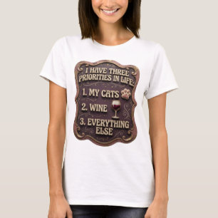 CAMISETA EU TENHO TRÊS PRIORIDADES NA VIDA 1 MEUS GATOS 2 V