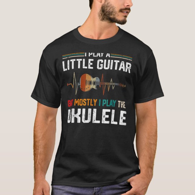 Camiseta Eu Toco Um Pouco De Violão Mas A Maioria Ukulele P (Frente)