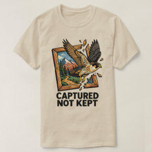Camiseta Falcão Capturado Não Mantido Rompendo a Moldura