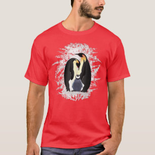 Camiseta Família de pinguins bonitos no gelo e neve