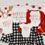 Camiseta Família Feliz Feliz Feliz de Natal<br><div class="desc">Esta camisa doce e divertida de crianças de Natal é um lugar para você adicionar um nome,  com "Feliz Natal" em tipografia brilhante colorida. Disponível em todos os tamanhos,  para o design perfeito para suas camisas de Natal da família.</div>