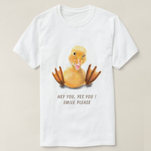 Camiseta Feliz Piscar os olhos de Reprodução de Pato Amarel