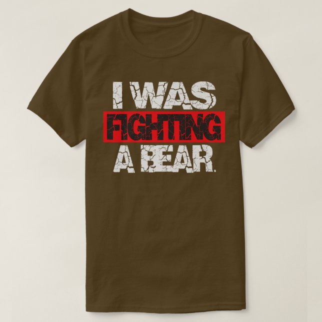 Camiseta Ferimento Engraçado Eu estava lutando contra o urs (Frente do Design)