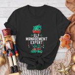 Camiseta Festa da Equipe do Elf de Natal e Correspondência<br><div class="desc">Coloque sua equipe de escritório, família ou amigos no espírito de feriado com nossas camisetas de Natal engraçadas! Perfeito para festas de escritório, reuniões familiares ou eventos festivos, estas camisas trazem uma reviravolta divertida para a época de férias. Quer seja para trabalho, roupas de família ou amigos, estas camisetas farão...</div>