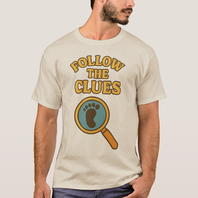 Camiseta “Follow the Clues” T-Shirt (Frente)