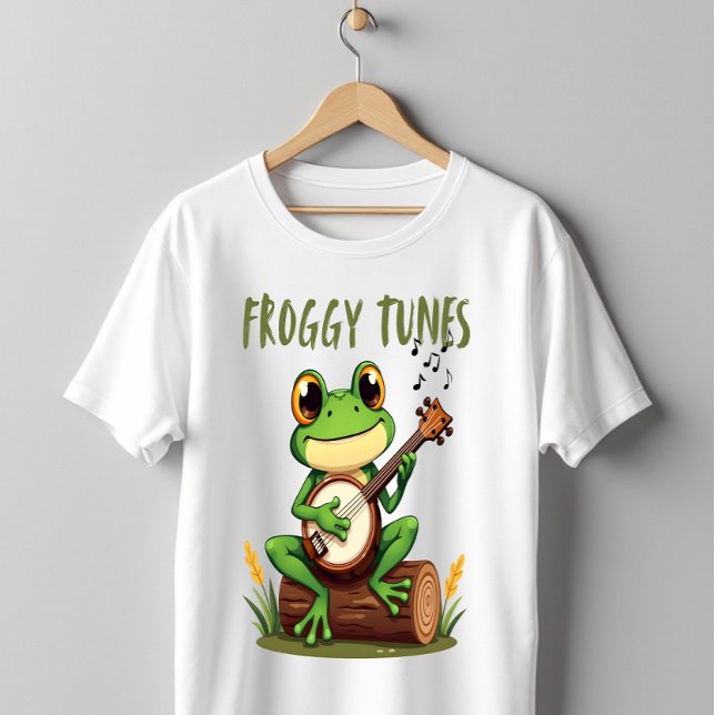 Camiseta Froggy Tunes: Adorable Cartoon Frog Playing Banjo (Criador carregado)