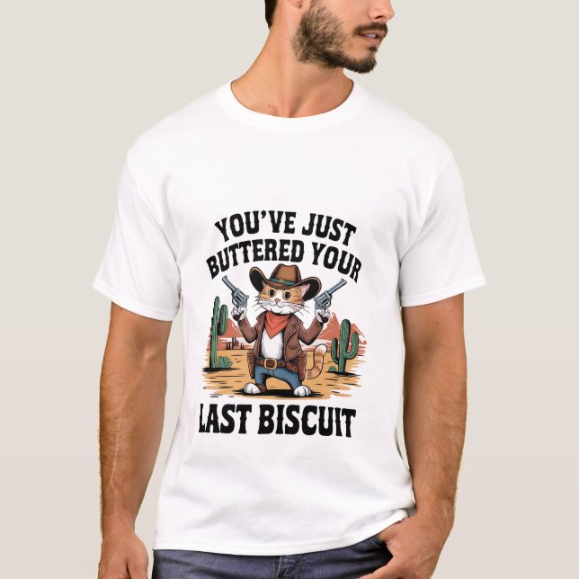 Camiseta Funny Cowboy Cat "Buttered Your Last Biscuit" ✨🤠 (Frente)