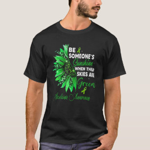 Camiseta Girassol Seu Céu É Awarenes De Escoliose Verde
