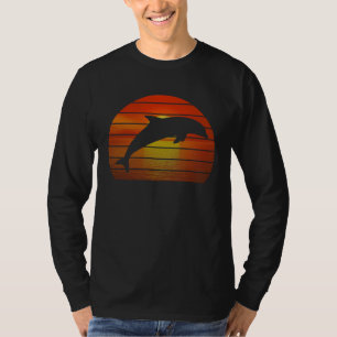 Camiseta Golfinho saltando laranja retrô pôr do sol oceano