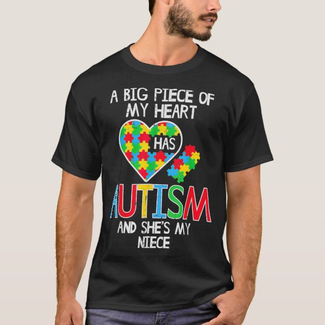 Camiseta Grande Pedaço Do Meu Coração Tem Autismo Conhecime (Frente)