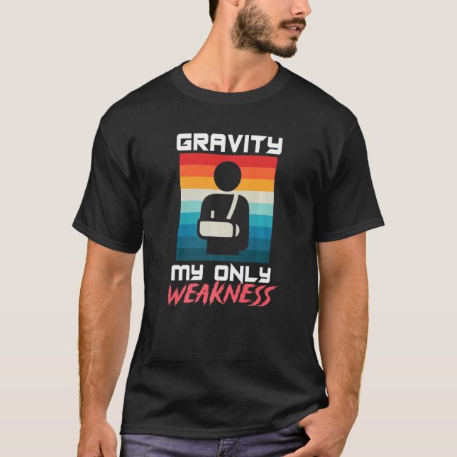 Camiseta Gravidade Minha Única Fraqueza Quebrou Acidente De (Frente)