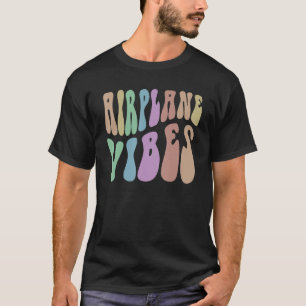 Camiseta Groovy AIRPLANE VIBES Facilmente distraído por voa