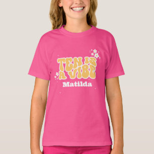 Camiseta groovy arco-íris dez é uma margarida retrô legal d