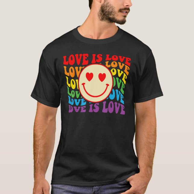 Camiseta Groovy Love Is Love Hippie Face Rainbow LGBT Gay A (Frente)