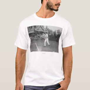 Camiseta Homem que joga o tênis no competiam do Washington