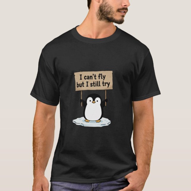 Camiseta “I can’t fly but I still try” cute penguin (Frente)