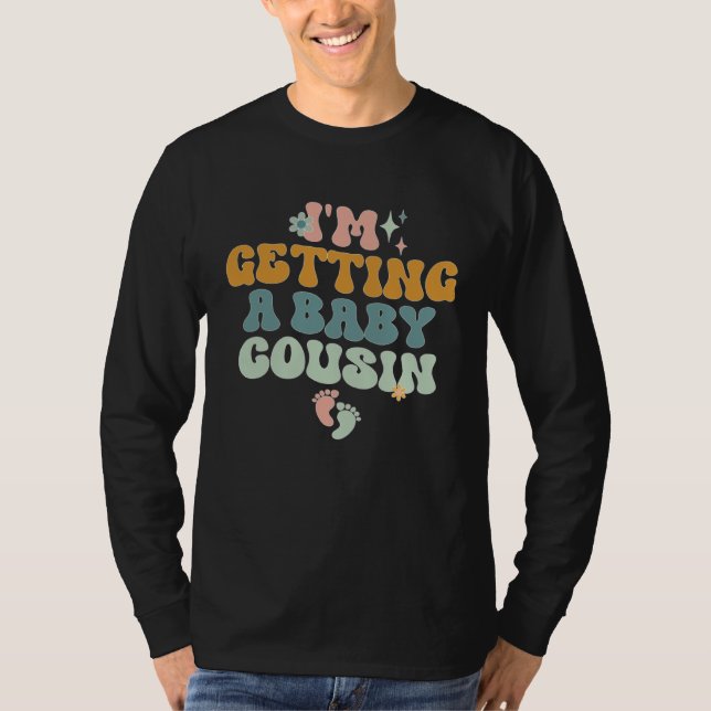 Camiseta I m Getting A Baby Cousin Baby Announcement Groovy (Frente)