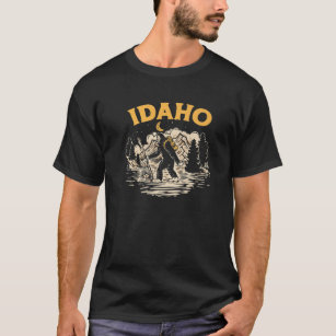 Camiseta Idaho Andando Montanhas De Rolos Noturnos Bigfoot