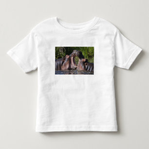 Camiseta Infantil África. Tanzânia. Hipopótamo esgrimindo