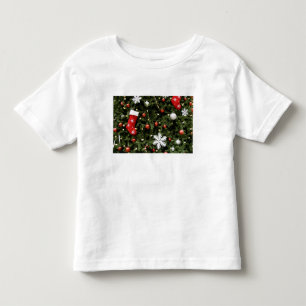 Camiseta Infantil America do Norte. Decorações do Natal na árvore