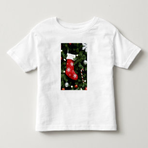Camiseta Infantil America do Norte. Decorações do Natal na árvore