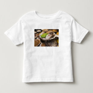 Camiseta Infantil Biscoitos do Natal na exposição em uma Nova Iorq