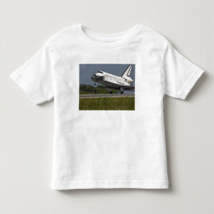 Camiseta Infantil Centro Espacial Kennedy da aterragem do esforço d