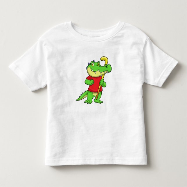 Camiseta Infantil Crocodilo no hóquei em campo com Stick (Frente)